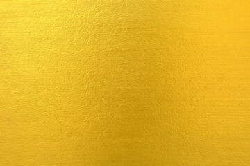 Gold Paint on Concrete Wall Texture Background.