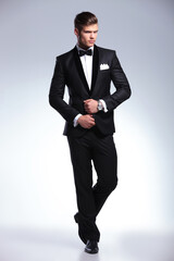 business man fixing his jacket