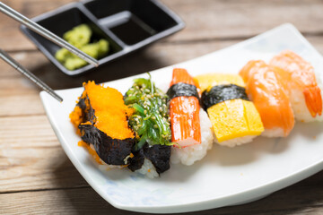 Close up of sashimi sushi set with chopsticks