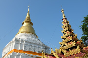 Fototapeta premium Ancient Pagoda at Wat Phra Kaew Don Tao Temple in Lampang Province, Thailand.