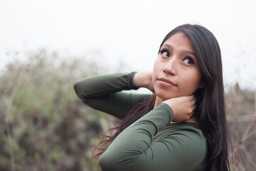 Really soft expression on nice looking young latin woman