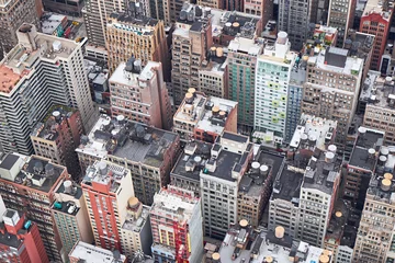 Crédence de cuisine en verre imprimé TAXI de new york NEW YORK CITY - OCTOBER 9, 2014: view to the roofs of  the buildings below the Empire State Building