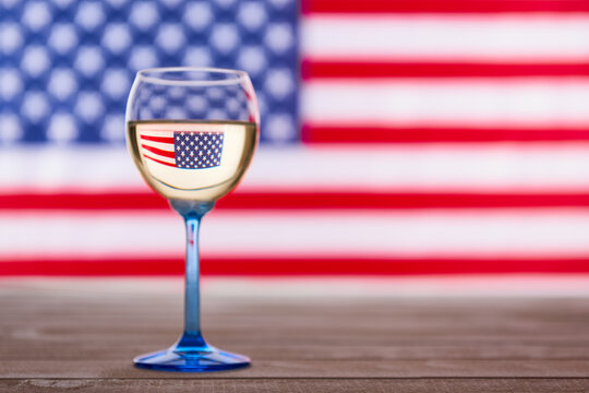 American flag and glass of white wine, party concept