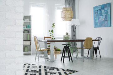 Dining room with brick wall