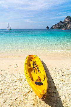 Amazing view of beautiful beach with kayak on the sand. Location: Phi Phi Island, Krabi province, Thailand, Andaman Sea. Artistic picture. Beauty world.