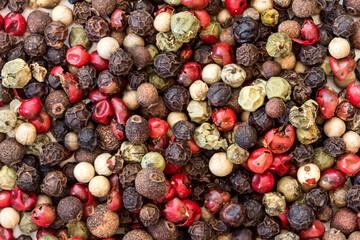 Close up mixed type of the peppercorns background , top view or overhead shot