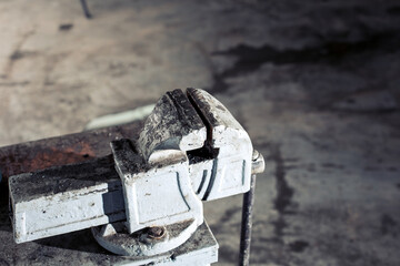 tool mechanics on the table in the garage. Articulating magic friction arm large super clamp crab...