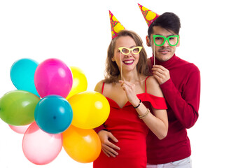 Obraz na płótnie Canvas Young couple with balloons