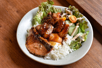 Braised belly pork and charcoal grilled salmon with rice.