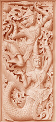 Traditional Old wood carving on the wall of Temple in Thailand,  Thai style