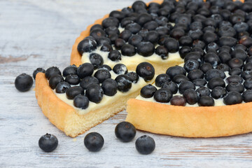 blueberry fruit cake on wood