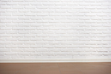 white brick wall with tiled floor, abstract background photo