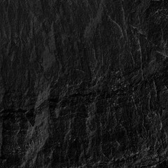 Dark grey black slate background or texture.