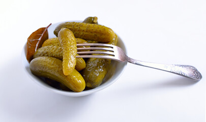 Marinaded Cucumbers in the white plate