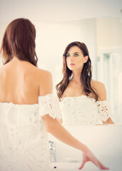 youn woman near mirror