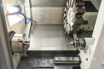 Abstract scene of CNC lathe machine (Turning machine) while cutting the screw thread with glowing edge lighting effect