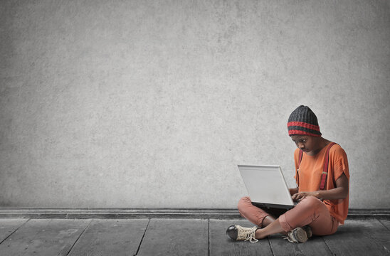 Urban girl using a laptop