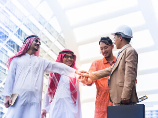 A group of business partner are hands coordination. Teamwork and business concept.