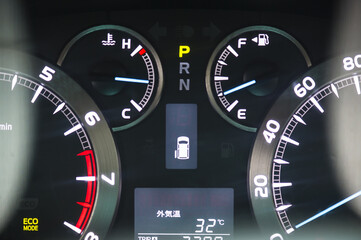 Fototapeta premium Speed gauge with engine light.