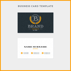 Obraz premium Double-sided vintage business card template with retro typographic logo and black textured background. Vector illustration. Stationery design