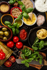 Food background Food Concept with Various Tasty Fresh Ingredients for Cooking. Italian Food Ingredients. View from Above with Copy Space.