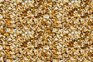 A large horizontal background of fresh popcorn