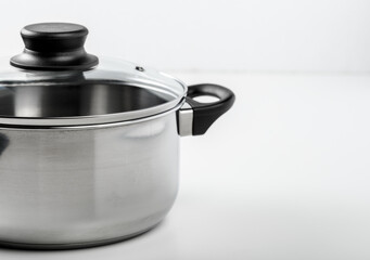 Steel saucepan isolated on white background