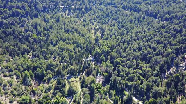 Aerial drone video of Hymetus mountain and Kessariani monastery, Attica, Greece