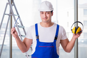 Young worker with noise cancelling headphones