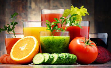 Glasses with fresh organic vegetable and fruit juices