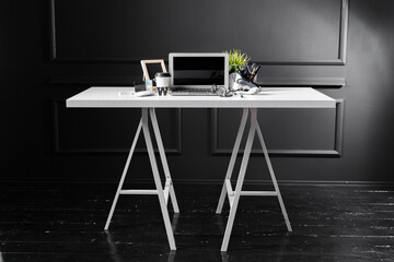 Office leather desk table with computer, supplies