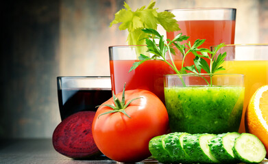 Glasses with fresh organic vegetable and fruit juices