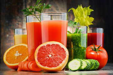 Glasses with fresh organic vegetable and fruit juices