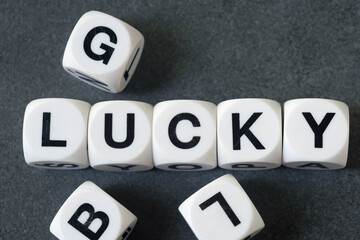 word lucky on toy cubes