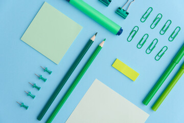 Office supplies on the blue background table