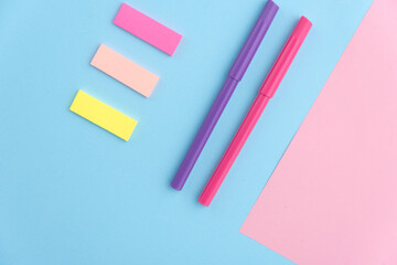 Office supplies on the blue background table