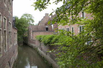 Fototapeta na wymiar Beguinage at Leuven Belgium. Canal.