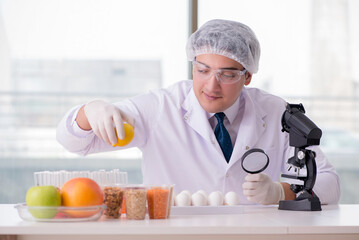 Nutrition expert testing food products in lab