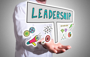 Leadership concept above a human hand