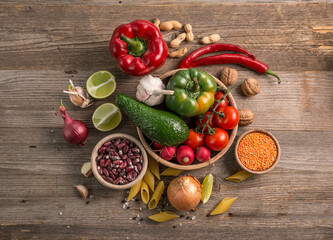 Cut lemot and pepper, fresh veggies, topview