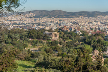 Fototapeta premium Temple of Hephaestus in the ancient agora, in the park under the hill of the Acropolis in Athens, Greece