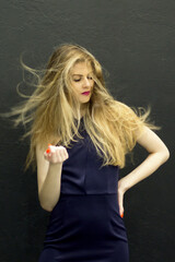 Fototapeta premium dancing girl with flying blond hair