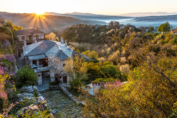 Fototapeta na wymiar Sunrise on the picturesque village of Vitsa in Zagori area, Northern Greece