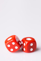 Red dice on white background
