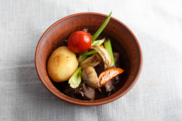 Grilled meat with vegetables in a plate