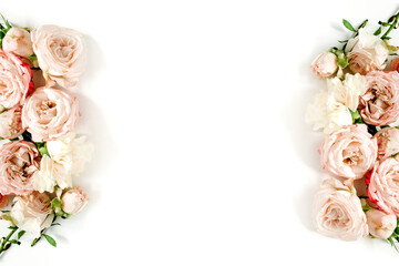 Flower border frame made of beige roses on white background. Flat lay, top view. Floral texture background.