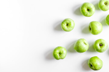 ripe green apples white table background top view space for text