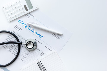 stethoscope, billing statement for doctor's work white background top view space for text