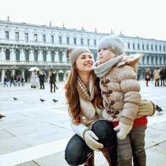 Fototapeta premium mother and daughter in Venice, Italy having fun time