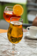 Traditional Spritz aperitif and beer  in a bar in Italy